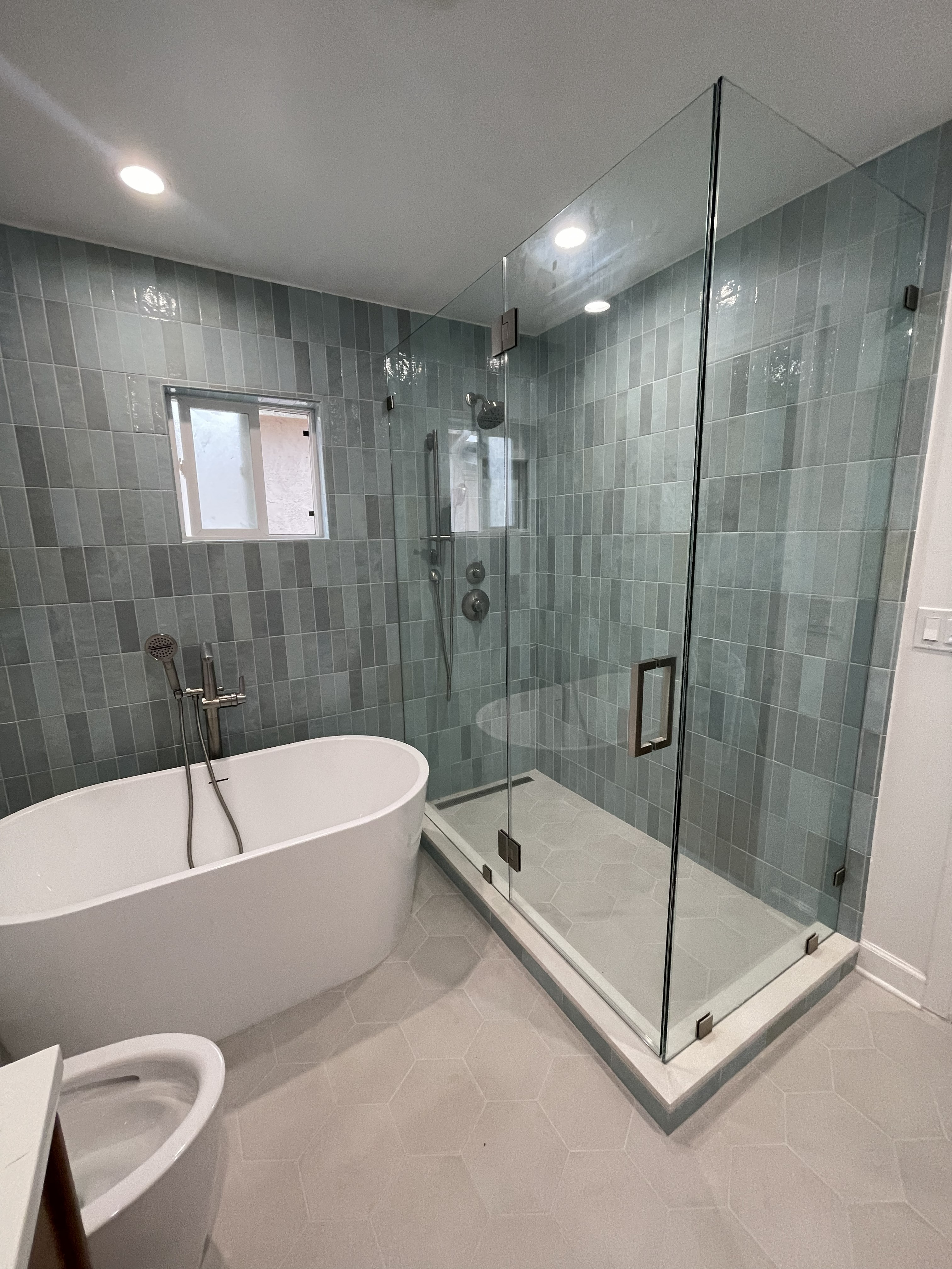 Freestanding tub with seafoam tile and hexagon floor - Burbank